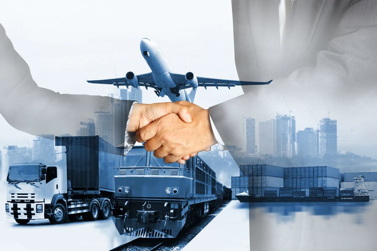 Intermodal freight infrastructure — maritime container vessel, rail freight, and commercial trucking